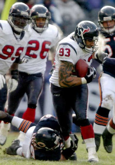 
Jason Babin, with the ball, was traded from Houston to Seattle on Saturday. Associated Press
 (Associated Press / The Spokesman-Review)