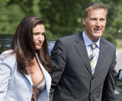 
In this 2007 file photo, Maxime Bernier arrives to be sworn in as minister of foreign affairs accompanied by Julie Couillard in Ottawa. Associated Press
 (Associated Press / The Spokesman-Review)