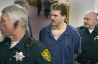 
Clifford Meyers is led into the courtroom to hear the jury's verdict in his murder trial Tuesday in Spokane. 
 (Christopher Anderson / The Spokesman-Review)