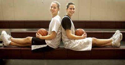 
The Bjorklund sisters carry on a family legacy of basketball. Angie, a sophomore, and Jami, a senior, have become outstanding players for the University High School team.
 (Holly Pickett / The Spokesman-Review)