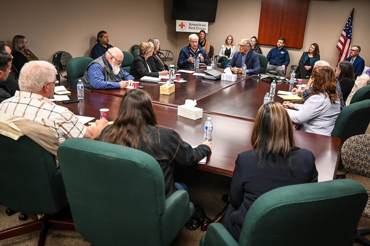 Gov. Jay Inslee gathers with the Spokane Long-Term Recovery Group at the American Red Cross, Thursday, Oct. 12, 2023, in Spokane. The group gathered to assess the recovery efforts after the August wildfires  (DAN PELLE/THE SPOKESMAN-REVIEW)