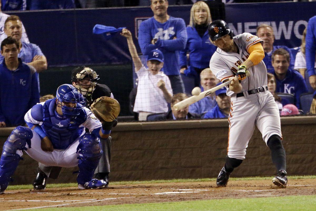 Giants’ right fielder Hunter Pence smacks a two-run home run in the first inning of Game 1 of the World Series on Tuesday in Kansas City. (Associated Press)