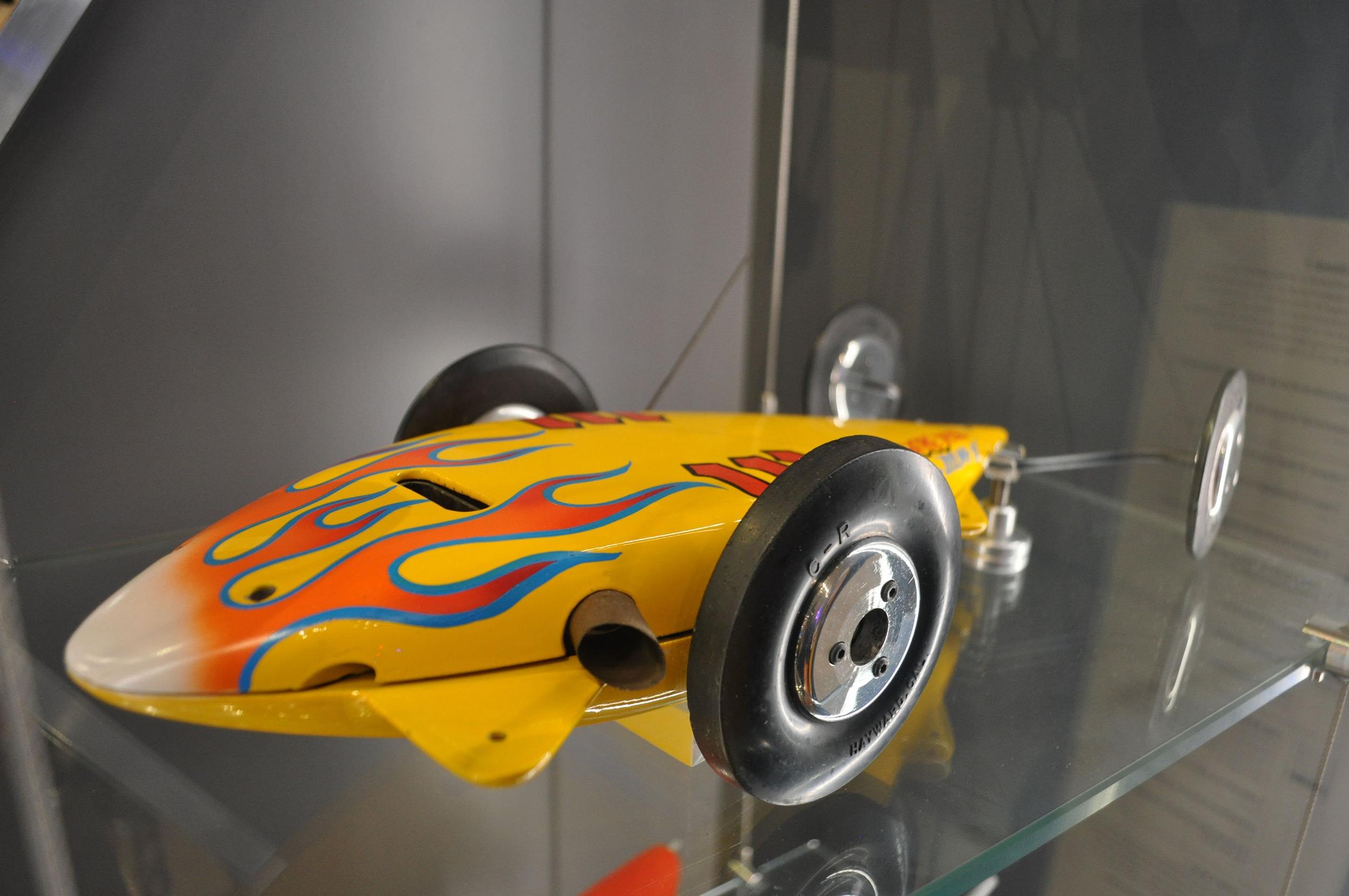 Kitschy fair souvenirs, a carousel and a super fast tiny car