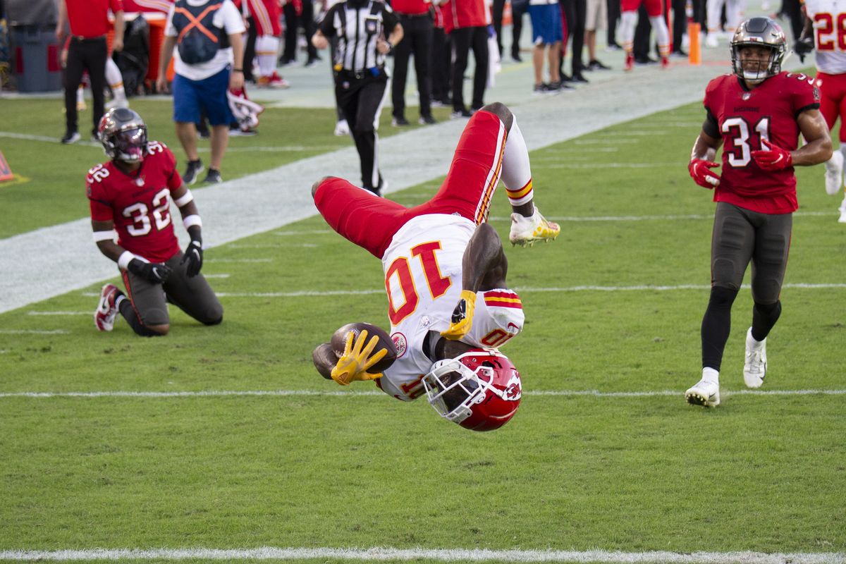 FILE - In this Nov. 29, 2020 file photo, Kansas City Chiefs wide receiver Tyreek Hill (10) does a back flip into the end zone to score a touchdown against the Tampa Bay Buccaneers during an NFL football game in Tampa, Fla. Hill was unstoppable against Tampa Bay in late November. The speedy Kansas City star caught 13 passes for 269 yards and three touchdowns in the Chiefs