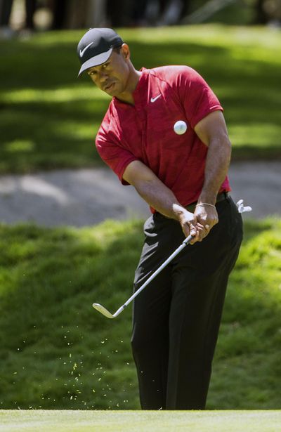 In this Feb. 24, 2019 photo, Tiger Woods hits the ball on the first hole during the WGC-Mexico Championship at the Chapultepec Golf Club in Mexico City. Woods has withdrawn from the Arnold Palmer Invitational with what he describes as a neck strain. Woods announced his decision Monday. March 4, 2019, on Twitter. (Associated Press)