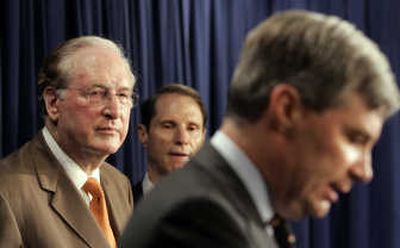 
Sen. John D. Rockefeller IV, D-W.Va, left, and Sen. Ron Wyden, D-Ore., center, listen as Sen. Sheldon Whitehouse, D-R.I.,  speaks Thursday during a news conference on Iraq in Washington. Associated Press
 (Associated Press / The Spokesman-Review)