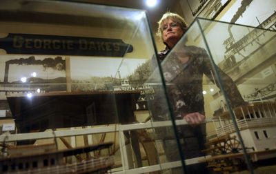 Museum of North Idaho board member Kathy Arneson near the steamboat display at the museum in Coeur d’Alene on Tuesday. (Kathy Plonka / The Spokesman-Review)
