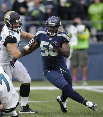 Cliff Avril and his Seattle teammates are trying to open a season with four straight wins for first time. (Associated Press)