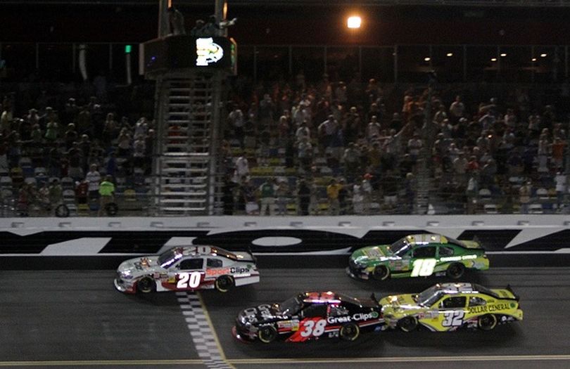 Joey Logano leads No. 38 Jason Leffler, No. 32 Reed Sorenson and No. 18 Kyle Busch across the start/finish line in the NASCAR Nationwide Series Subway Jalapeno 250 powered by Coca-Cola on Friday at Daytona International Speedway in Daytona Beach, Fla. (Photo Credit: Jerry Markland/Getty Images for NASCAR) (Jerry Markland / Getty Images North America)