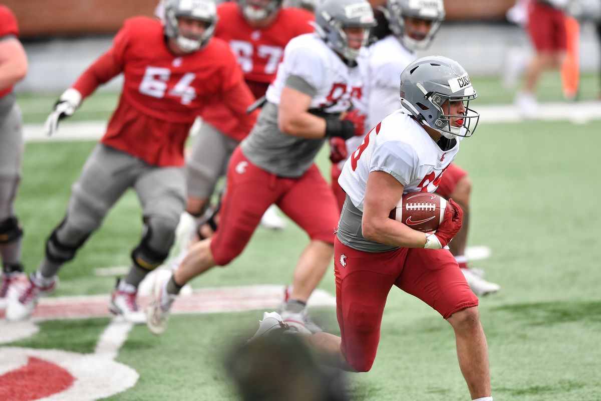 Washington State linebacker Frank Cusano returns an interception during the Cougars’ first spring scrimmage April 6 at Gesa Field in Pullman.  (Tyler Tjomsland/The Spokesman-Review)