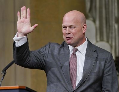 Acting Attorney General Matthew Whitaker gestures after speaking at the Dept. of Justice’s Annual Veterans Appreciation Day Ceremony, Thursday, Nov. 15, 2018, at the Justice Department in Washington. (Pablo Martinez Monsivais / Associated Press)
