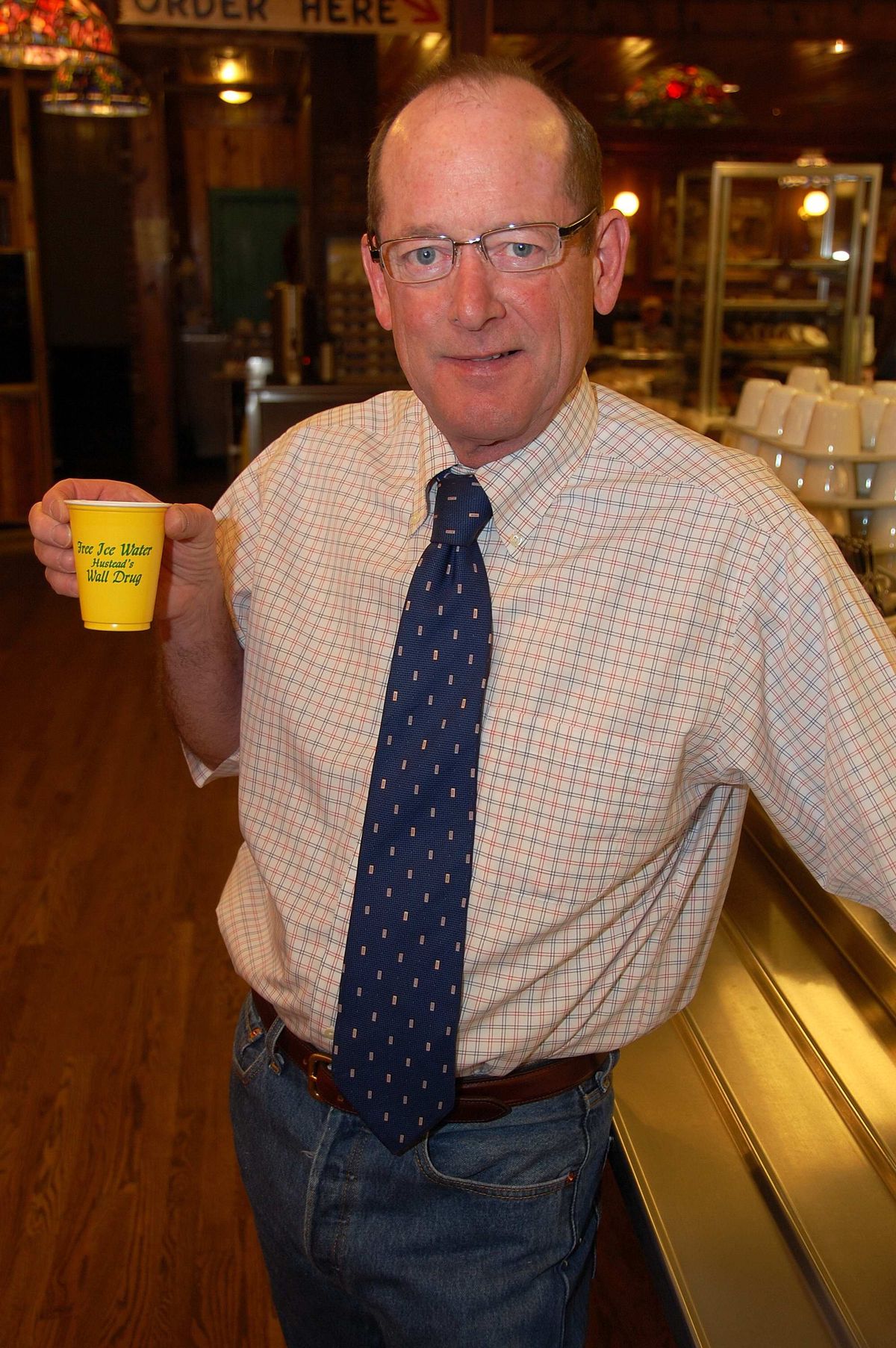 Wall Drug President Ted Hustead poses for a photo with the store’s famous free ice water in Wall, S.D. (Associated Press / The Spokesman-Review)