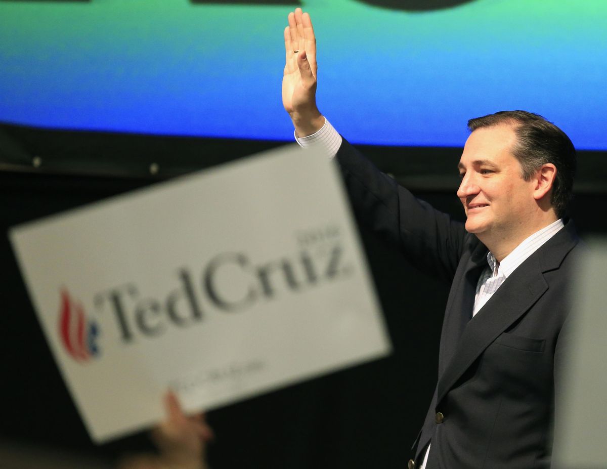 Republican presidential candidate, Sen. Ted Cruz, R-Texas waves to the crowd at the GOP caucus in Wichita, Kan., Saturday, March 5, 2016. (Orlin Wagner / Associated Press)