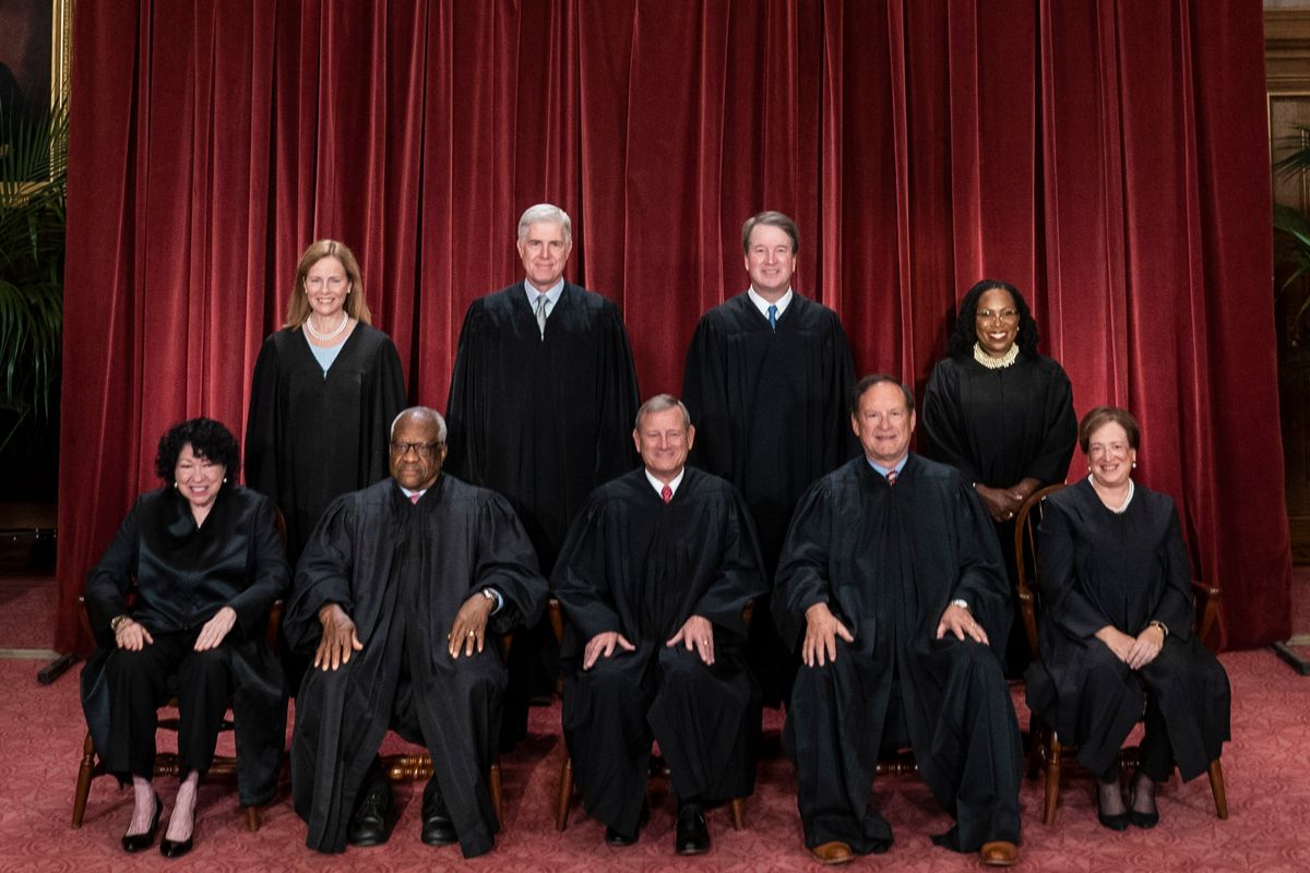 Members of the Supreme Court sit for a group photo in 2022 in Washington, D.C. 