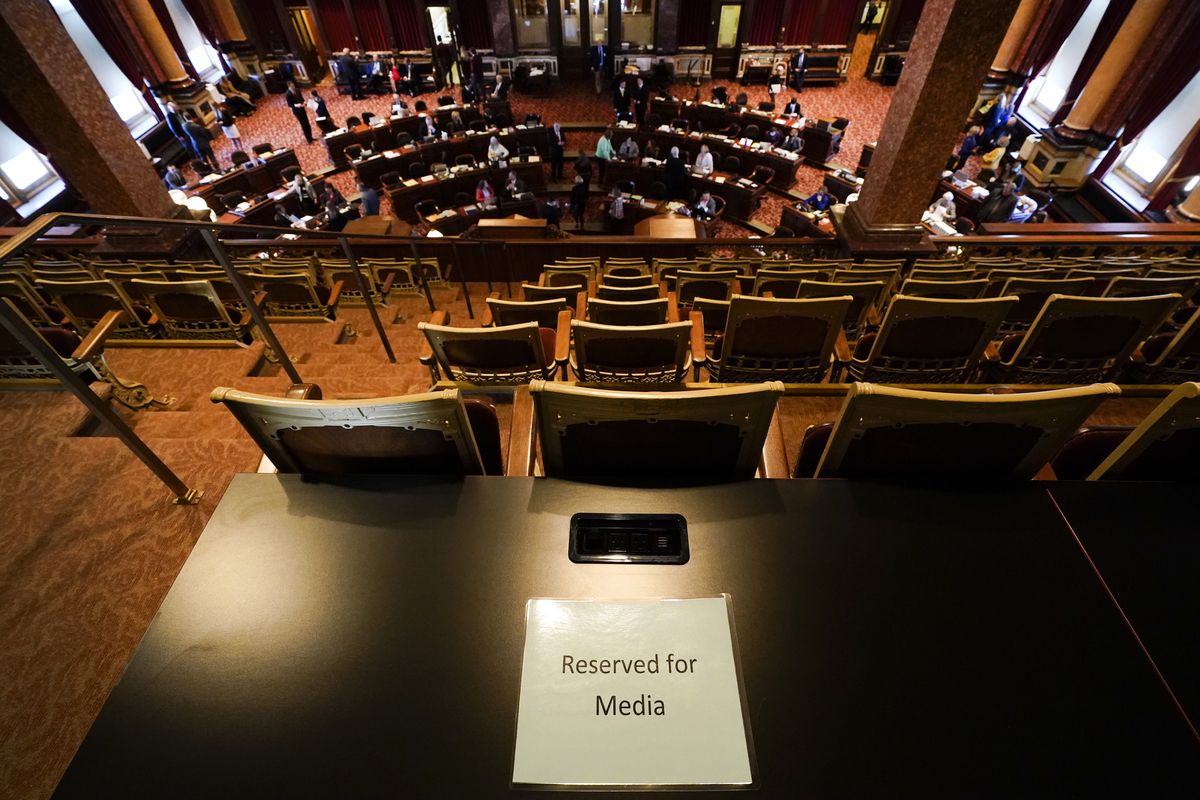 FILE - A Reserved for Media sign sits on a table in the Iowa Senate gallery during the opening day of the Iowa Legislature on Jan. 10, 2022, at the Statehouse in Des Moines, Iowa. Utah