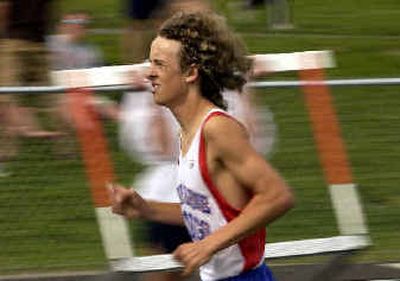 
Coeur d'Alene's Michael Armon runs by himself more than 100 yards ahead with a couple laps to go in the 3200 meters at the District I Meet of Champions in Post Falls. He was an easy winner. Coeur d'Alene's Michael Armon runs by himself more than 100 yards ahead with a couple laps to go in the 3200 meters at the District I Meet of Champions in Post Falls. He was an easy winner. 
 (Jesse Tinsley/Jesse Tinsley/ / The Spokesman-Review)