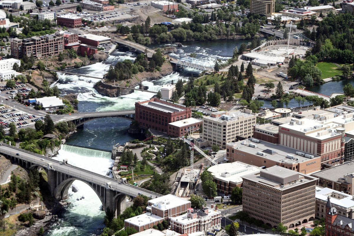 2018 – Spokane's famous waterfalls thunders over an 18-foot manmade spillway below the historic Washington Water Power's Post St. substation. White settlers putting the Spokane River to work to grind wheat, mill lumber and generate electricity may be one of the greatest impacts of the river from white settlement. WWP is now Avista Utilities. Jesse Tinsley/THE SPOKESMAN-REVIEW (Jesse Tinsley / The Spokesman-Review)