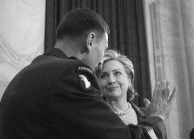 
Senate Armed Services Committee member Sen. Hillary Rodham Clinton, D-N.Y.,  talks with Lt. Gen. David Petraeus, President Bush's nominee for U.S. commander in Iraq, in Washington on Tuesday. 
 (Associated Press / The Spokesman-Review)