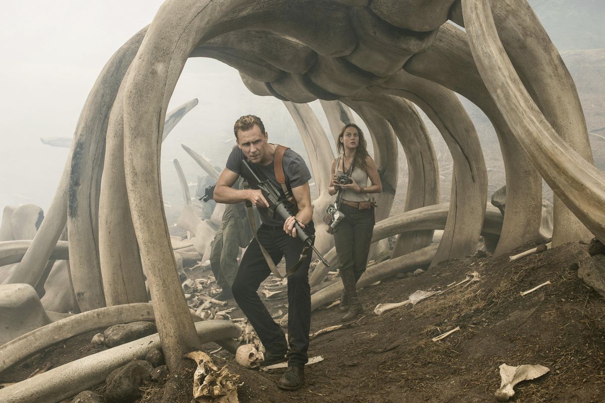 Tom Hiddleston, left, and Brie Larson appear in a scene from, "Kong: Skull Island." (Chuck Zlotnick / AP)