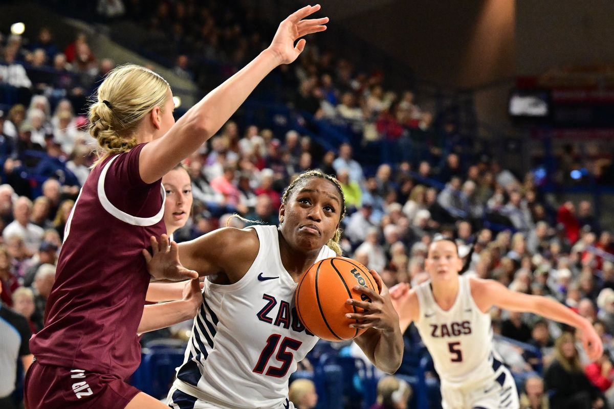 Gonzaga Bulldogs forward Yvonne Ejim (15) drives to the basket against the Montana Grizzlies during the first half of a college basketball game on Tuesday, Nov. 5, 2024, at McCarthey Athletic Center in Spokane, Wash.  (Tyler Tjomsland/The Spokesman-Review)