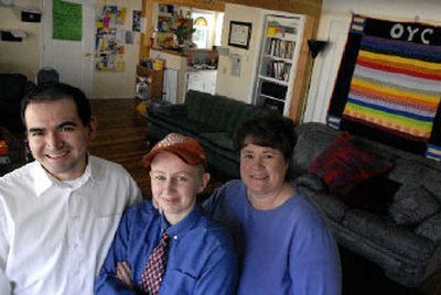 
Odyssey Youth Center's Ramon Alvarez, executive director, left, Kelly Stevens, volunteer facility coordinator, and Ann Marie Floch, volunteer youth program coordinator, gather at the center. 
 (Jed Conklin / The Spokesman-Review)