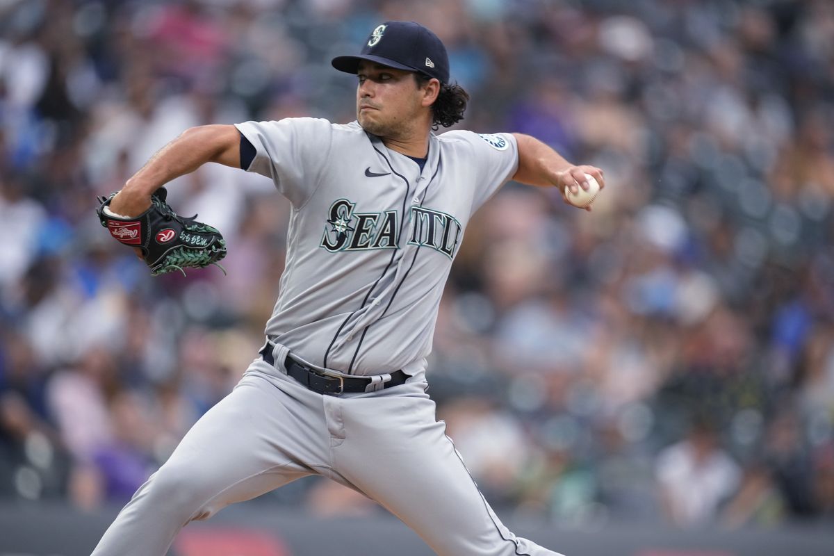 Seattle Mariners starting pitcher Marco Gonzales works against the Colorado Rockies during the first inning of a baseball game Tuesday, July 20, 2021, in Denver.  (Associated Press)