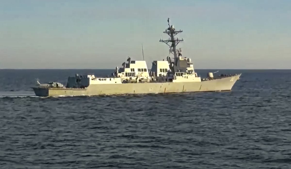 In this photo taken from video released by Russian Defense Ministry Press Service, the U.S. destroyer USS Chafee is seen form Russian navy