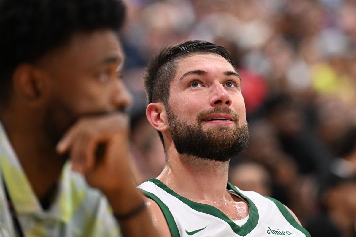 Boston center Killian Tillie (38) smiles from the bench after coming out of the game against Miami during an NBA Summer League matchup on Saturday,Jul. 13, 2024, at Cox Pavilion in Las Vegas, Nev.  (Tyler Tjomsland/The Spokesman-Review)