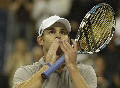 
Andy Roddick of the U.S. salutes the crowd after his win over Lleyton Hewitt. 
 (Associated Press / The Spokesman-Review)