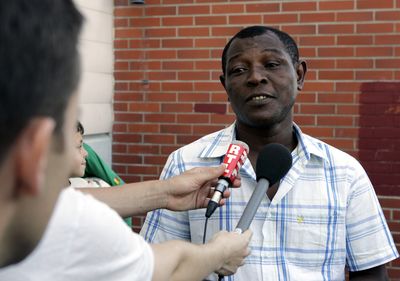 Kassim Bakari, the father of  the only known survivor of the plane crash  speaks outside his apartment in France.  (Associated Press / The Spokesman-Review)