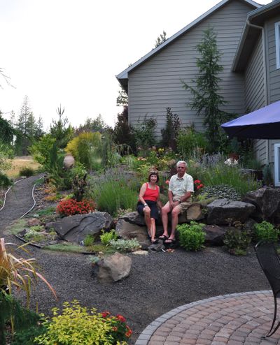 John and Maralee Karwoski have turned an challenging site into a luscious, hardy Mediterranean garden in Eagle Ridge.  (PAT MUNTS)