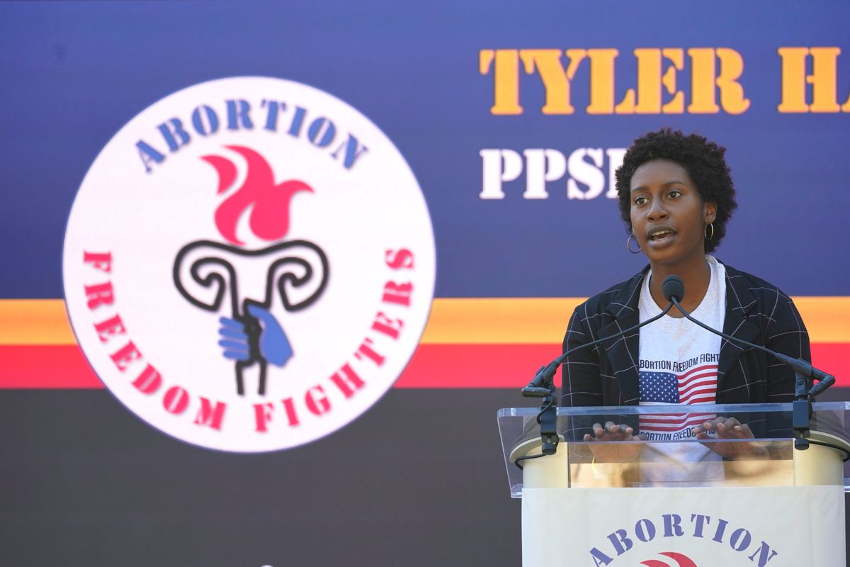The Mississippi director for Planned Parenthood Southeast, Tyler Harden, tells an audience of reproductive rights supporters that efforts to limit abortion access are "just another form of oppression" for women of color, at a rally in Smith Park Jackson, Miss., on Dec. 1, 2021.  (Rogelio V. Solis)