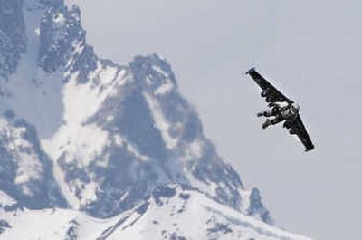 
Yves Rossy flies with a jet-powered wing over the Alps in Bex, Switzerland, on Wednesday. Associated Press
 (Associated Press / The Spokesman-Review)