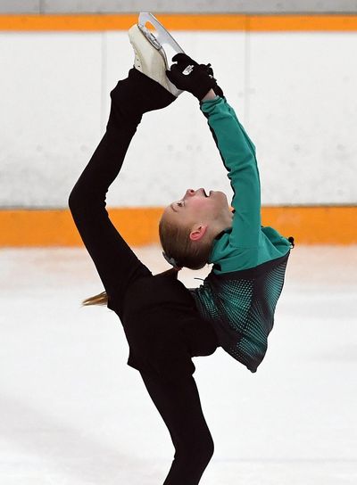 Emma Dickau, daughter of former Gonzaga basketball guard Dan Dickau, is the youngest local ice skater to make it to nationals in Detroit. (Colin Mulvany / The Spokesman-Review)