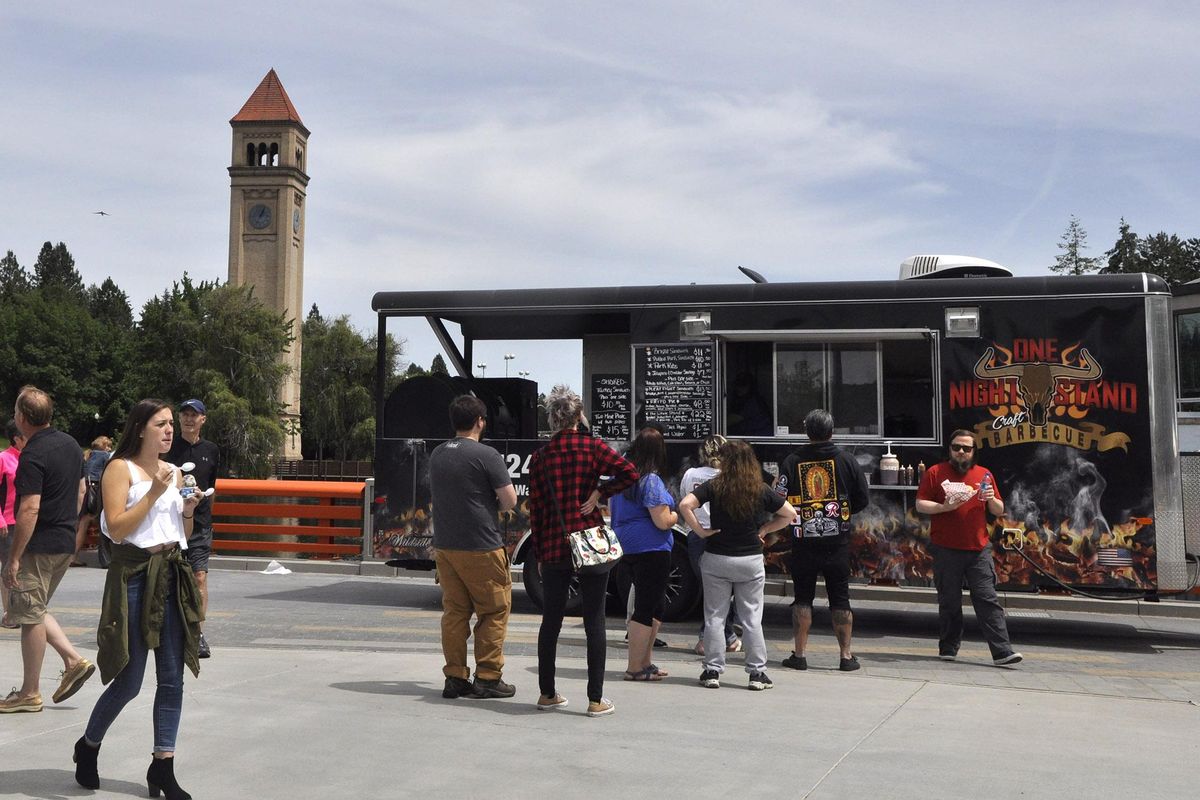 The One Night Stand Craft Barbecue food truck parks is scene at Riverfront Park on a recent Tuesday during a Riverfront Eats food truck rally. (ADRIANA JANOVICH/The Spokesman-Review)