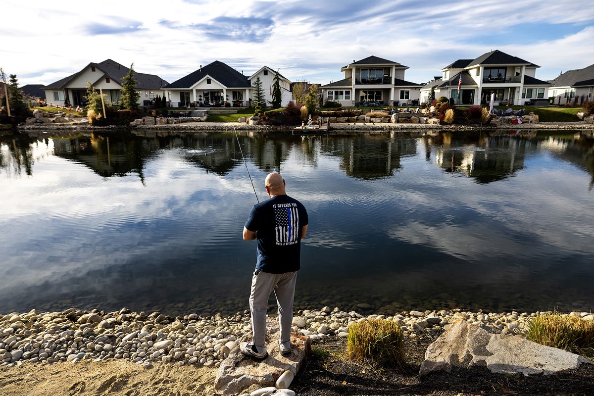 A retired 30-year veteran of the Los Angeles County Sheriff’s Department fishes behind his new home on a man-made pond at the Legacy planned community in Eagle, Idaho. Many of his neighbors are retired California police officers and firefighters.  (Gina Ferazzi/Los Angeles Times/TNS)