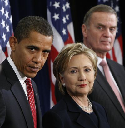 President-elect Barack Obama stands with Cabinet choices  Sen. Hillary Rodham Clinton and  Ret. Marine Gen. James Jones in Chicago on Monday.  (Associated Press / The Spokesman-Review)