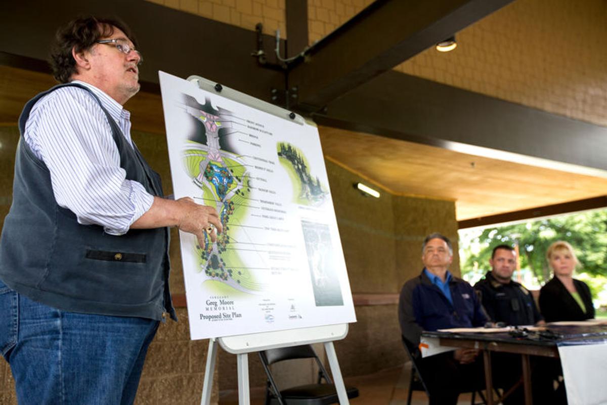 Landscape architect Jon Mueller of Architects West explains at a press conference Thursday key features of a proposed memorial plaza to be built at McEuen Park honoring Sgt. Greg Moore and all fallen first responders. The plans hope to have construction begin this fall, wrapping up by May of 2017. (Jake Parrish/photo)