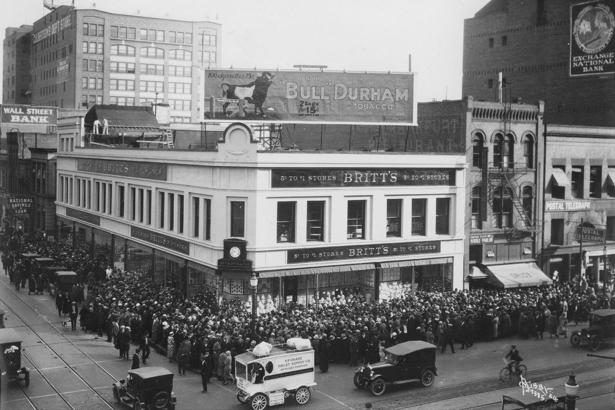 1924: Eager customers crowd around Britt’s, which opened its new location in 1924, replacing its store a block to the west. The new store at the corner of Riverside Avenue and Wall Street, expanded on the concept of a five-and-dime store which was already popular around the country, but this store was relabeled by owner John P. Brittan as a 5-cent to $1 store, expanding the price range of the inventory. The successful store chain was bought out by J.J. Newberry Co. around 1930 and greatly expanded after WWII. (Eastern Washington State Historical Society)