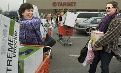 Experts believe the tax rebates that began arriving this week will likely go toward gas, groceries and debt reduction, rather than toward items considered more discretionary such as televisions or furniture.
(FIle / The Spokesman-Review)