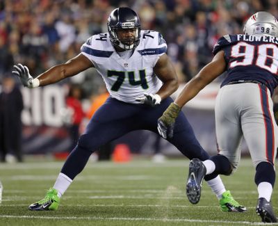Rookie offensive tackle George Fant, left, became a starter for the Seahawks halfway through last season. (Winslow Townson / Associated Press)
