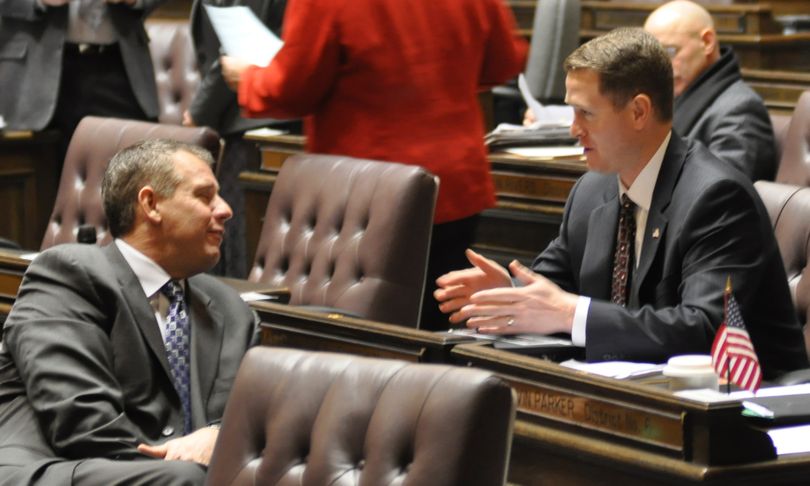 OLYMPIA -- House Minority Leader Richard DeBolt and Rep. Matt Shea, R-Spokane Valley, talk while waiting for the official start of the 2012 Legislative session. (Jim Camden)