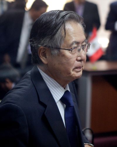 Peru’s former President Alberto Fujimori leaves the courtroom after the reading of his verdict in Lima on Tuesday.  (Associated Press / The Spokesman-Review)