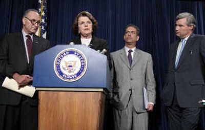 
Sen. Dianne Feinstein, D-Calif., second from left, accompanied by, from left, Sen. Charles Schumer, D-N.Y., Sen. Russ Feingold, D-Wis., and Sen. Sheldon Whitehouse, D-R.I., speaks on Capitol Hill in Washington, Thursday, calling for a perjury investigation against Attorney General Alberto Gonzales. Associated Press
 (Associated Press / The Spokesman-Review)
