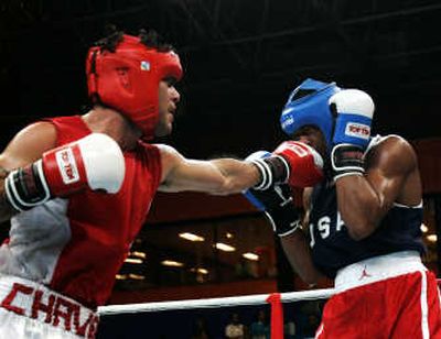 
Demetrius Andrade won Tuesday's Pan Am fight against Argentina's Diego Chavez to advance to the final. Associated Press
 (Associated Press / The Spokesman-Review)