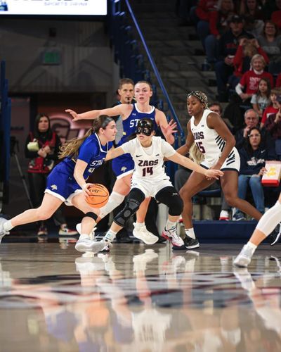 Gonzaga Bulldogs' Kaylynne Troung guards South Dakota State Jackrabbits' Paige Meyer on Sunday at McCarthey Athletic Center.  (Courtesy of Gonzaga Athletics)