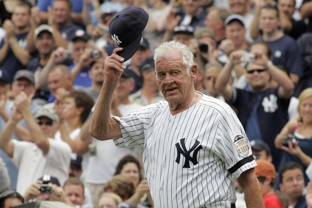 In this Aug. 2, 2008, photo, Former New York Yankees picher Don Larsen tips his hat to fans during introduction ceremonies before an old-timers baseball game at Yankee Stadium in New York. Larsen, the journeyman pitcher who reached the heights of baseball glory in 1956 for the Yankees when he threw a perfect game and the only no-hitter in World Series history, died Wednesday night, Jan. 1, 2020. He was 90. (Ed Betz / Associated Press)