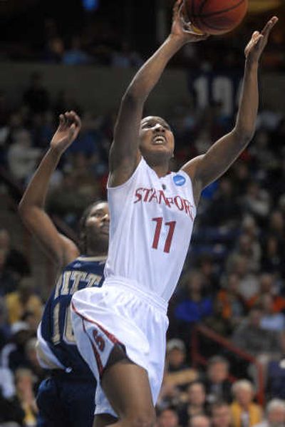 
Stanford's Candice Wiggins drives for a layup during her relatively quiet first half. 
 (Jesse Tinsley / The Spokesman-Review)