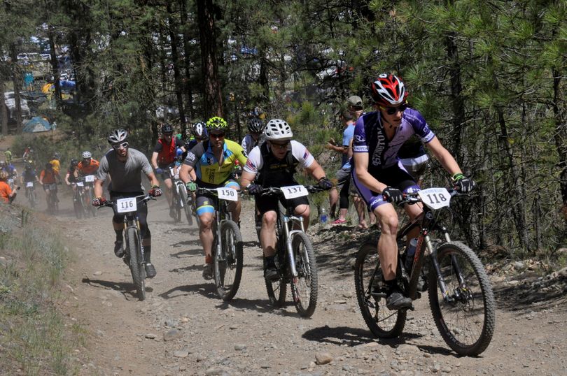Mountain bikers begin the first lap of the 24 Hours Round the Clock race at noon on May 23, 2015, at Riverside State Park. (Rich Landers)