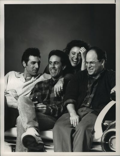Michael Richards, left, as Kramer, Jerry Seinfeld, Julia Louis-Dreyfus as Elaine and Jason Alexander as George.  (Chris Haston/NBC)